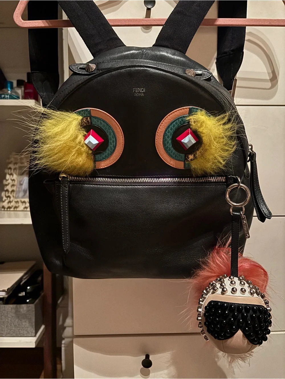 Fendi Black Backpack with Yellow Fur Eye Accents